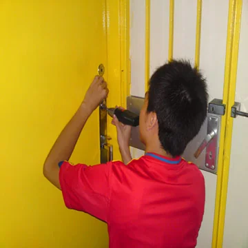 Dion Locksmith technician working on a customer’s door